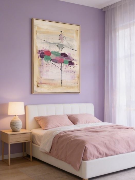 Modern bedroom with purple walls, white bed, pink bedding, wooden nightstand with lamp, and abstract ballet dancer artwork on wall
